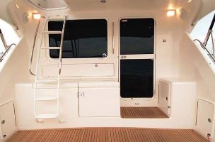 Hinged swing boat door