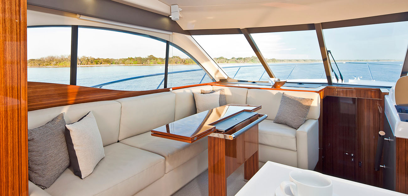 Modern yacht interior featuring marine glazing